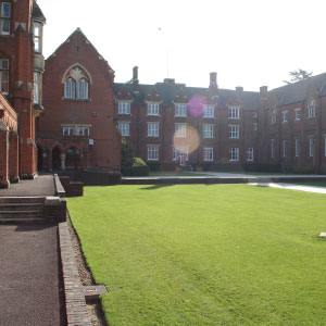 St John's School building exterior with lawn in foreground
